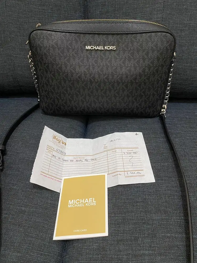 Michael Kors sling bag ( Authentic )