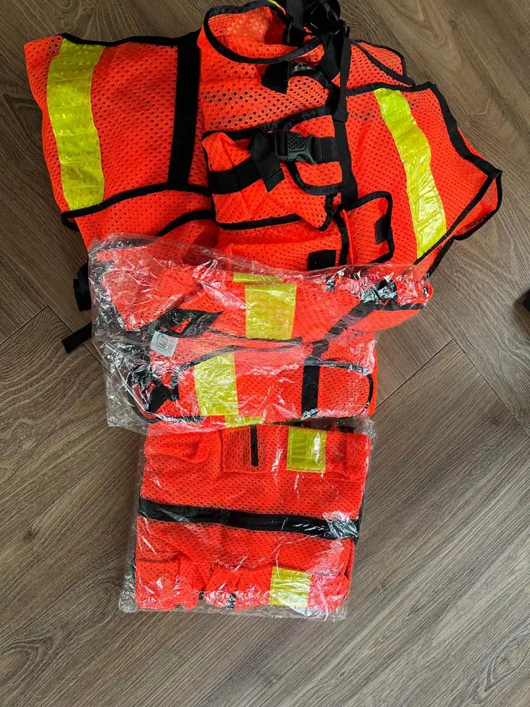 Rompi orange / masih baru