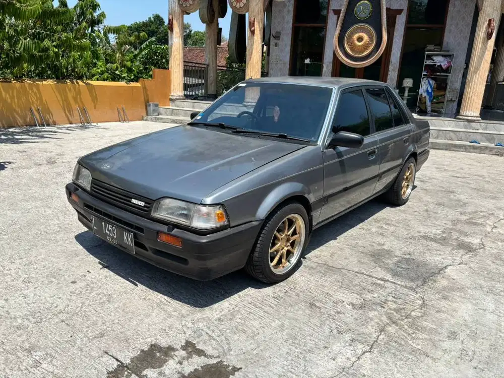 Mazda 323 elite plat L 1988 winda mobil bekas sekoto kediri