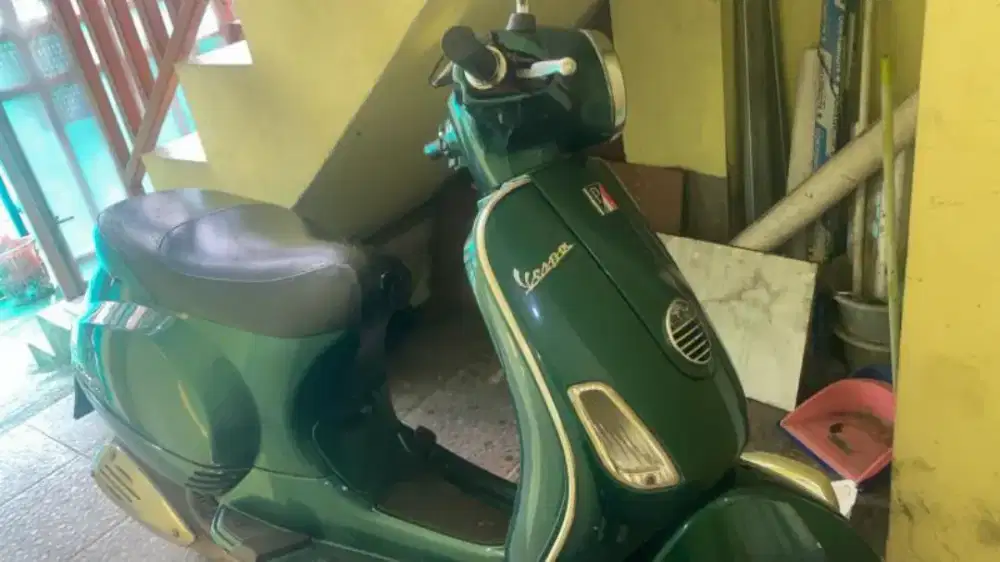 Vespa lx 150 warna hijau