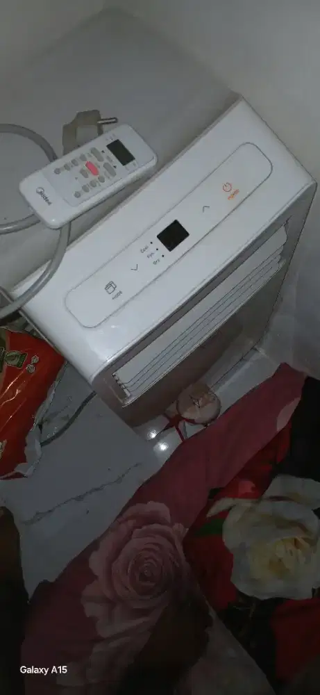 Ac portable midea 1/2 pk