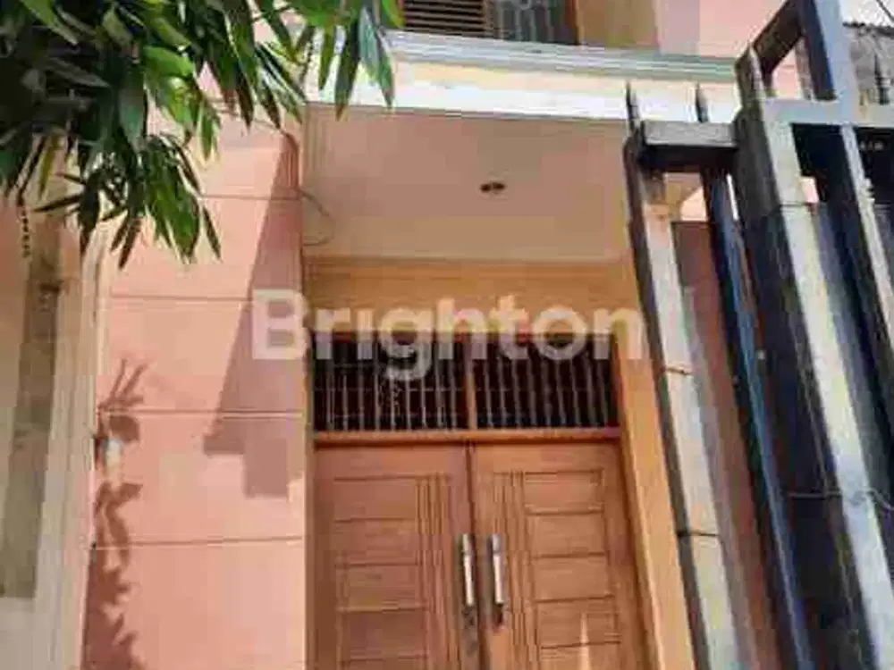 Rumah 1.5 lantai di tambora