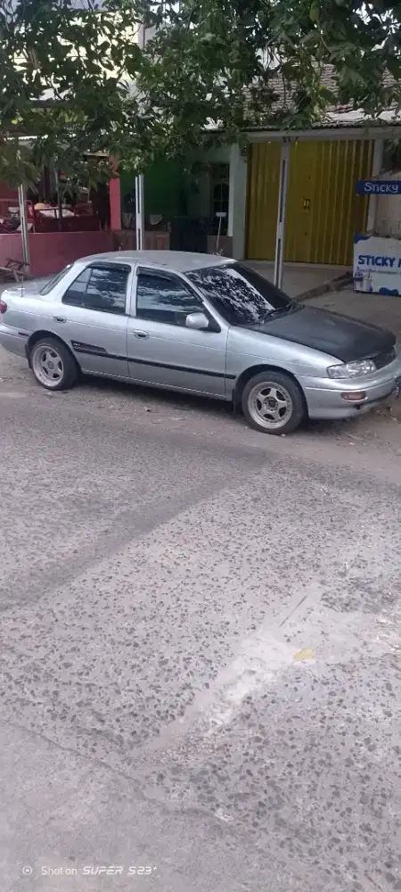 Timor DOHC 1999 Bensin , mesin halus terawat pakaian sendiri