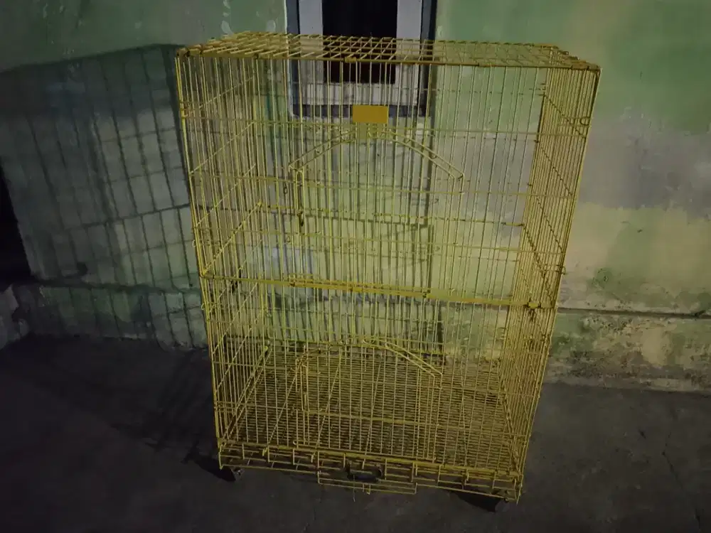 Kandang kucing besi