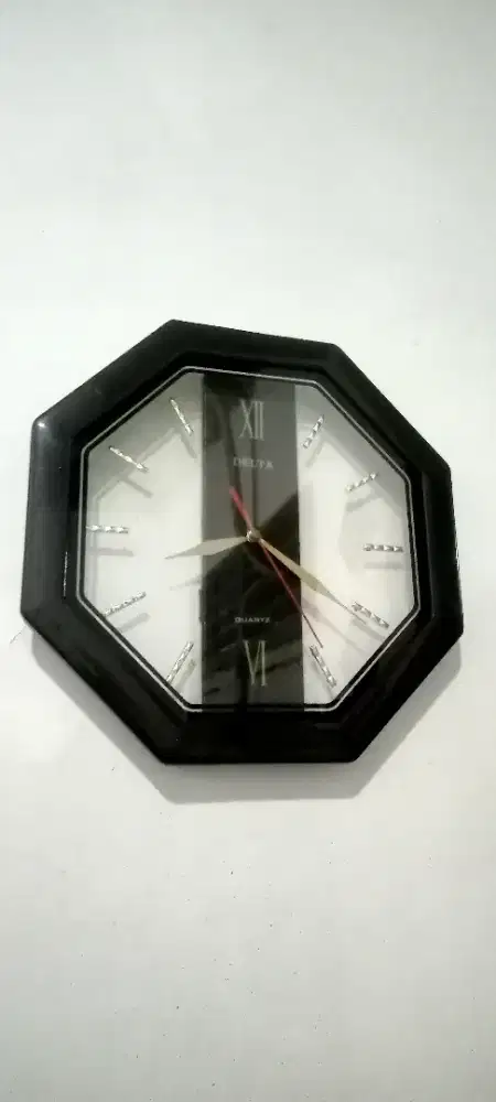 Jam Dingding Merk Delta Normal