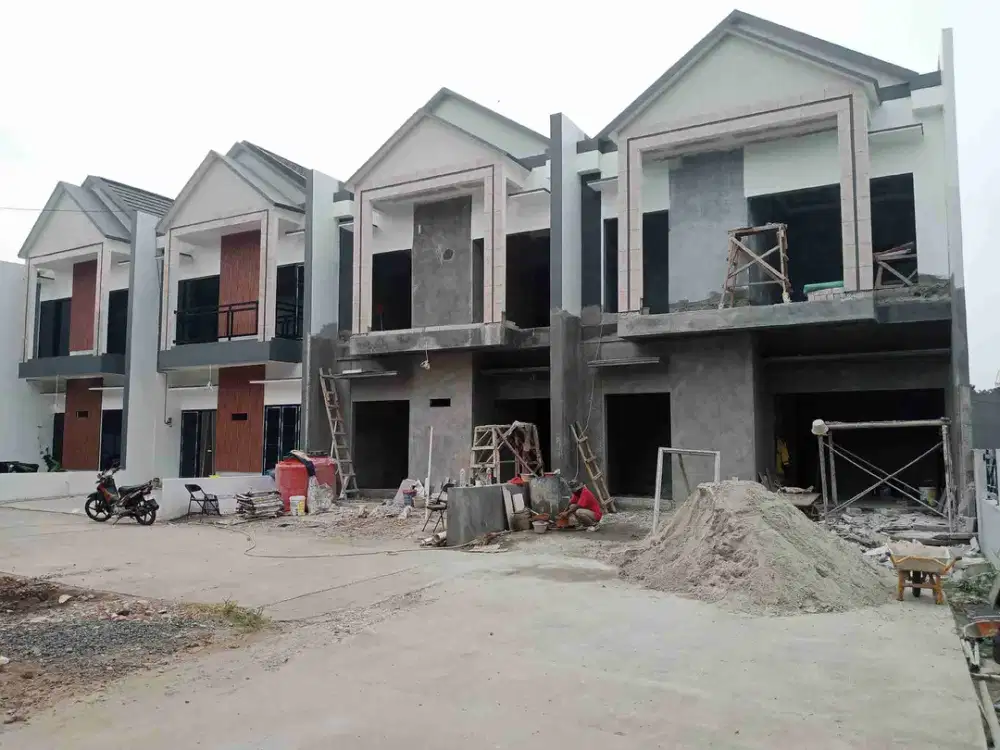 rumah modern 2 lantai siap huni, SHM sudah pecah per unitnya, dekat ke pintu tol