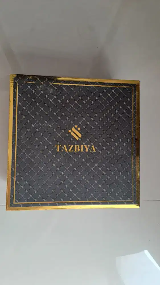TAZBIYA  Mukena  Premium Silk emboss - Dusty Pink