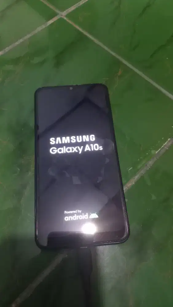 Samsung a10s mentok logo.