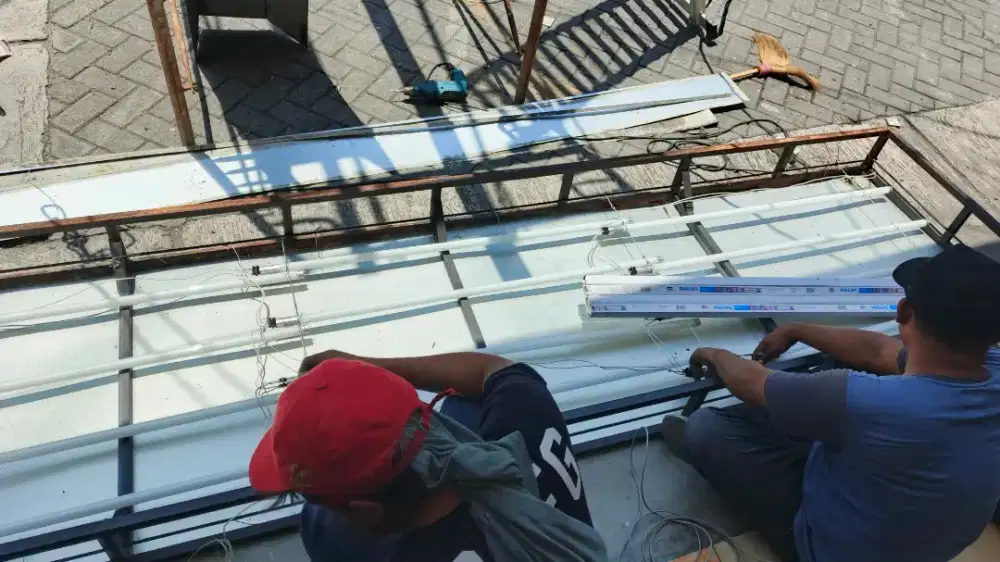Pusat service reparasi lampu neon box & ganti visual papannama reklame