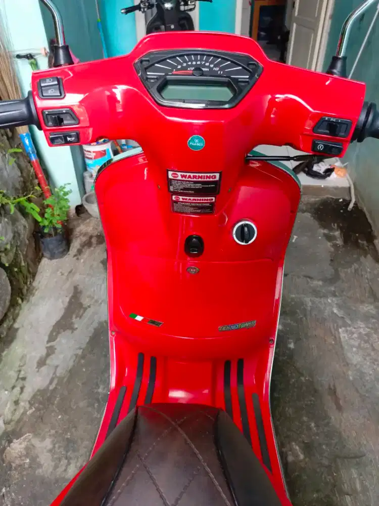 Greta 150 merah
