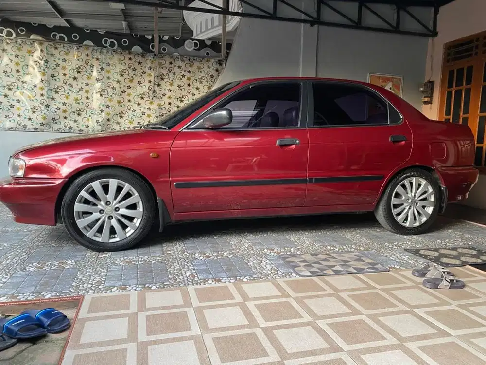 Suzuki baleno 1997 merah