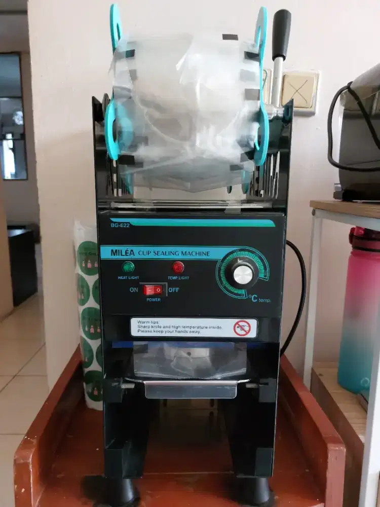 Cup sealer Milea