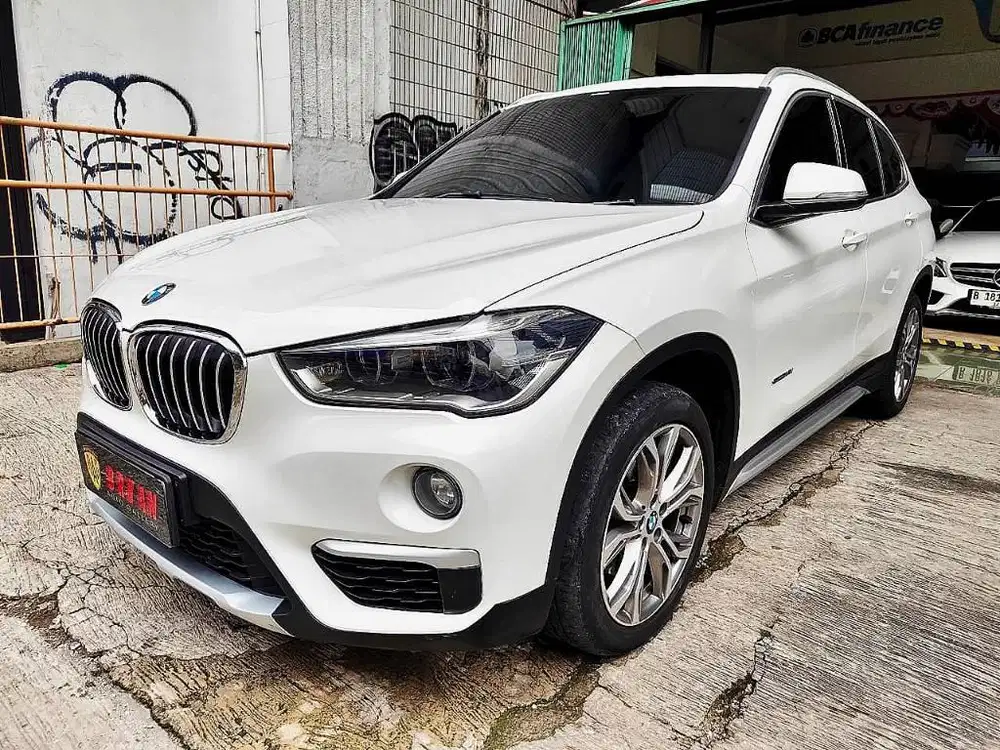 DP20JT BMW X1 XLINE PANORAMIC TERTINGGI