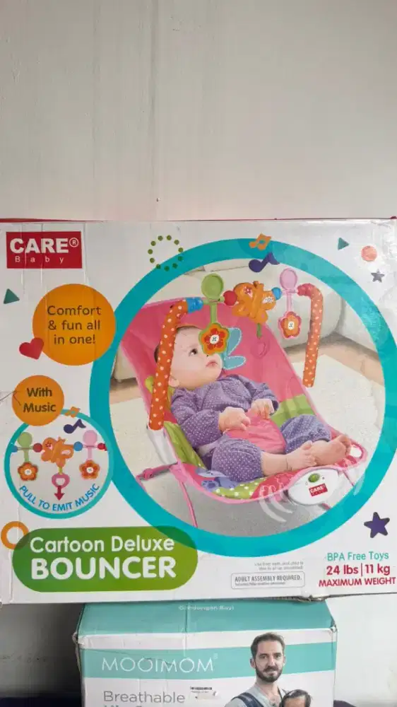 CARE BABY CARTOON DELUXE BOUNCER