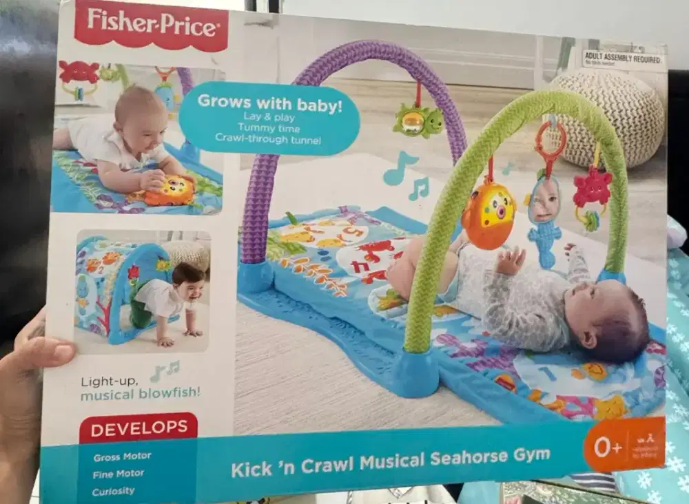 Fisher price Kick n crawl musical