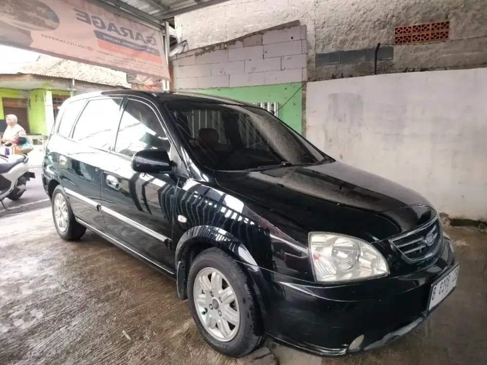 KIA Carens ll manual th2004