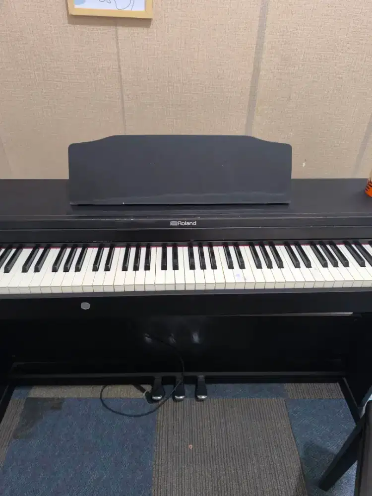 Piano digital Roland RP102