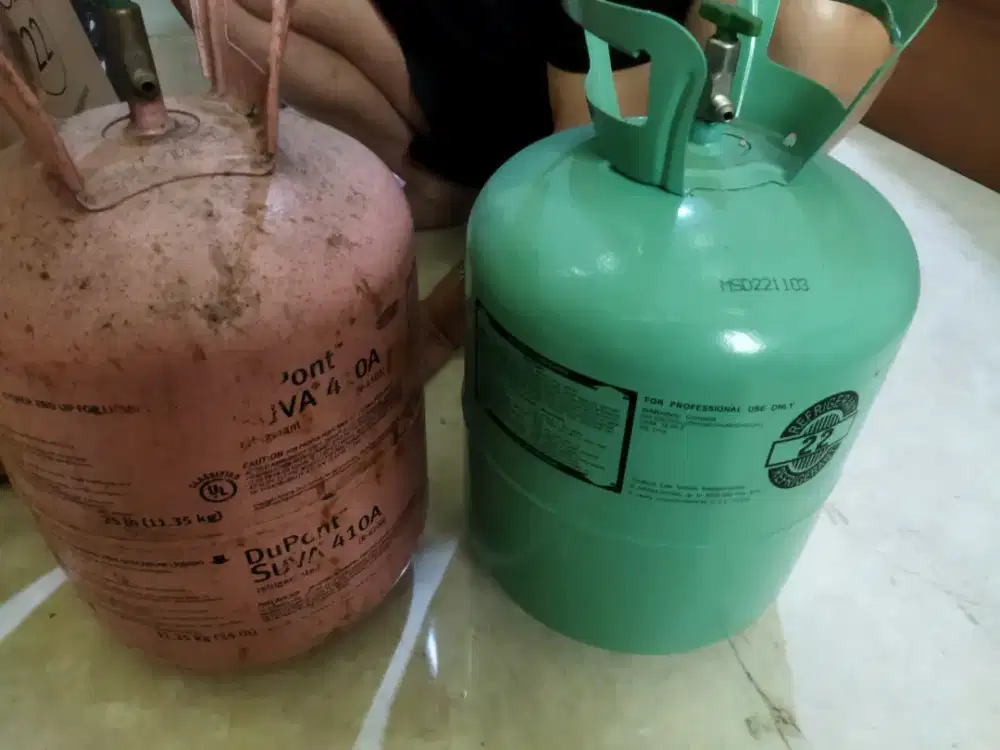 2 tabung freon AC 13.6  yg satu baru