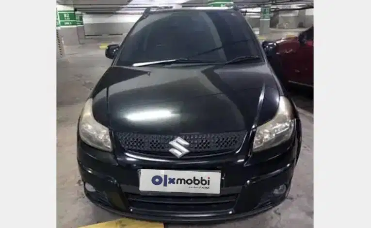 LOW DP Suzuki SX4 1.5 X-Over Bensin-MT 2011 SOW