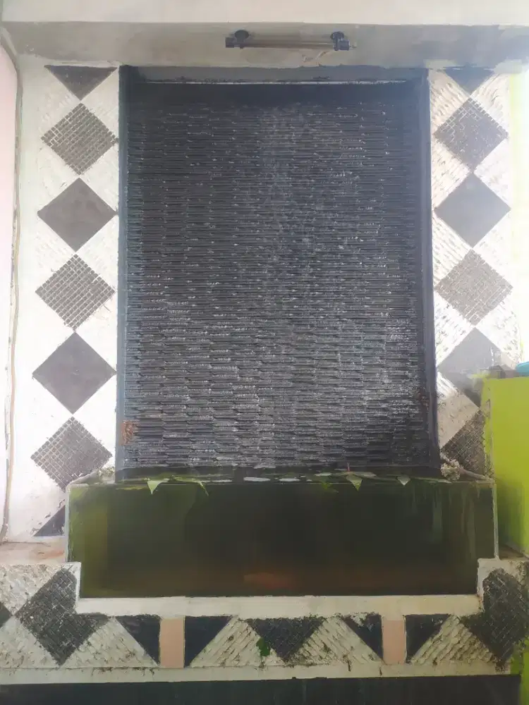 Jasa bikin kolam ikan minimalis
