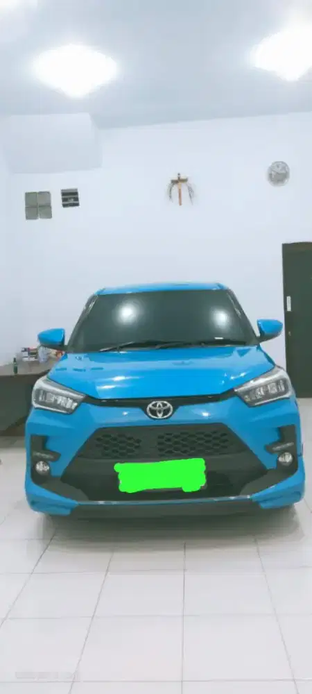 Mobil raize biru magenta