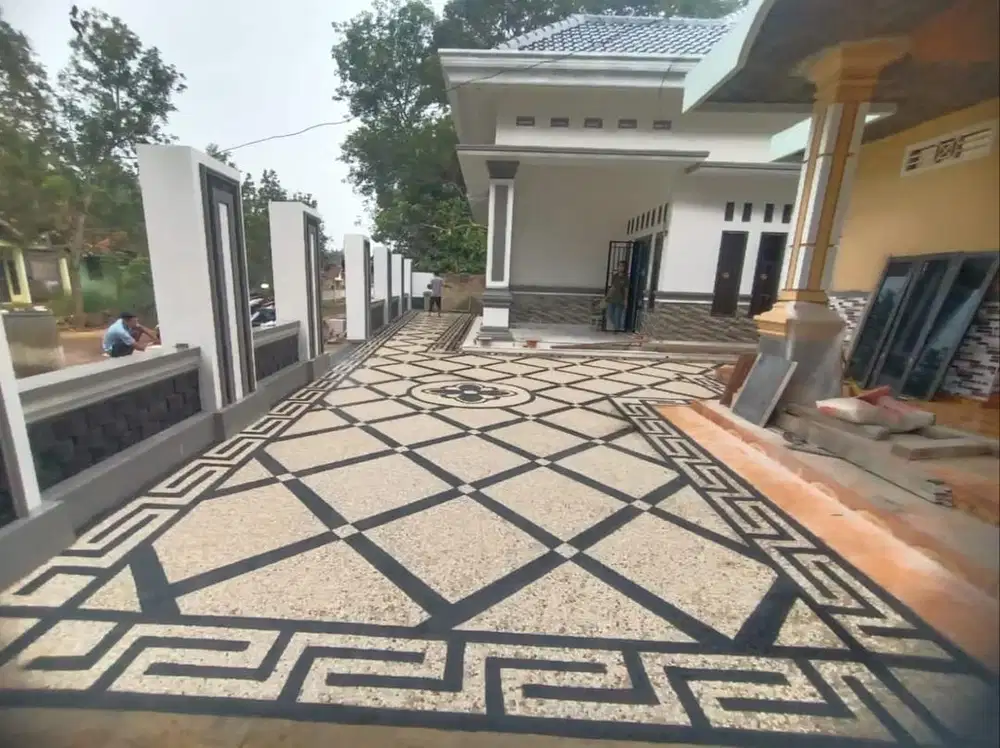 batu sikat motif rumah