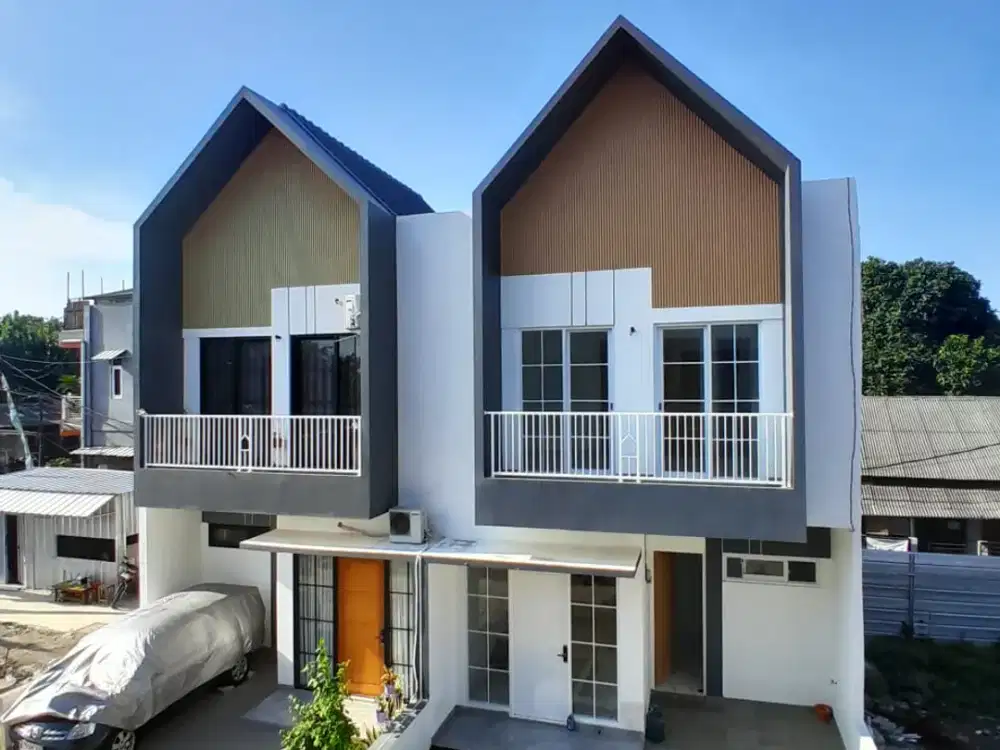 rumah 2 lantai dinding bata merah akses jalan 2 mobil
