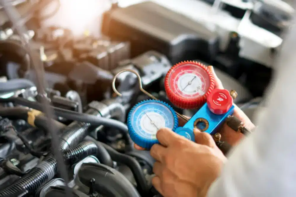 Isi freon n servis ac mobil