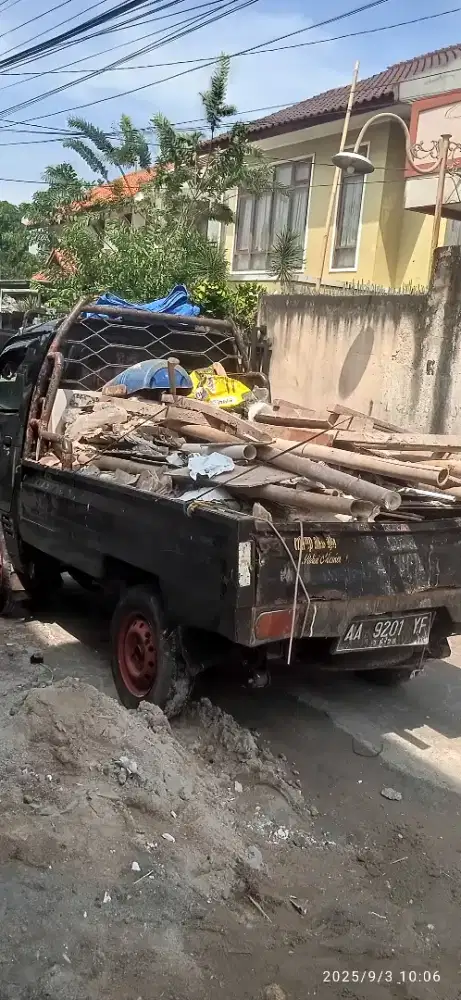 Buang sampah,puing dll.