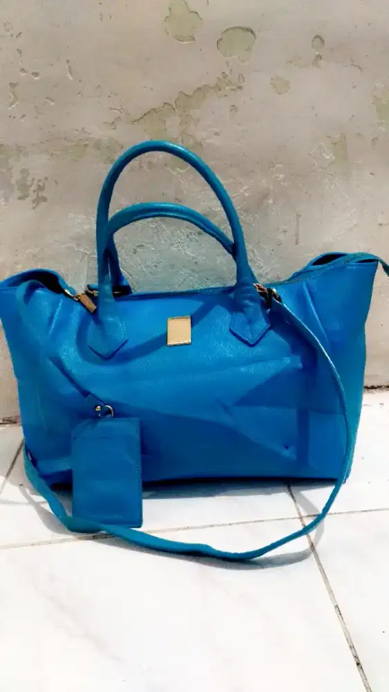 Handbag sling courune