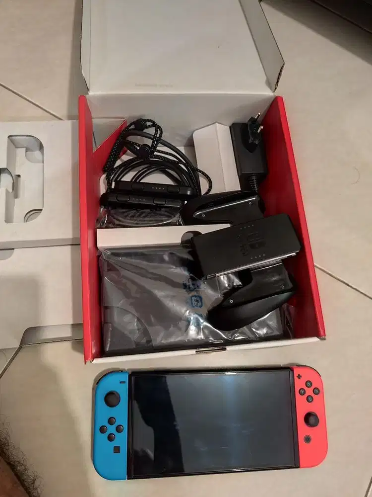 Nintendo switch Oled neon red & blue OFW internal 64GB