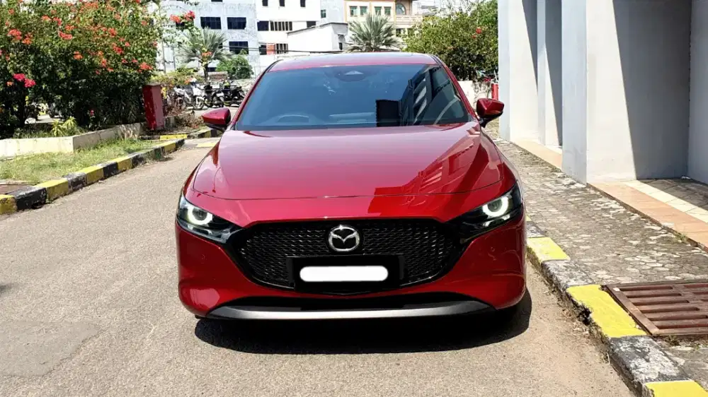 Mazda 3 hatchback skyactive 2023 sunroof merah
