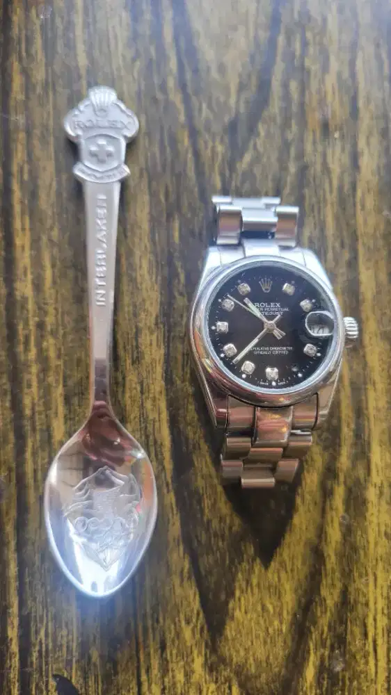ROLEX OYSTER PERPETUAL DATE  15200 BLACK DIAMOND AUTOMATIC