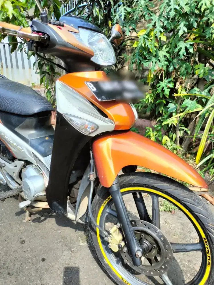 Honda Supra X 125 PGM-FI (Programmed Fuel Injection) tahun 2006