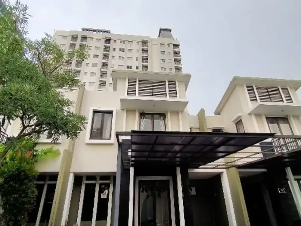 Rumah Townhouse Tropis Modern Cosmopark Strategis Dekat Grand Indonesia