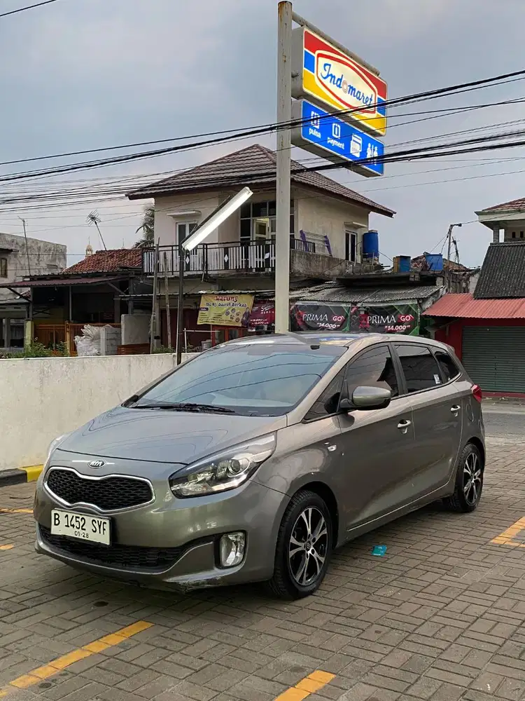 Kia carens 2013 manual