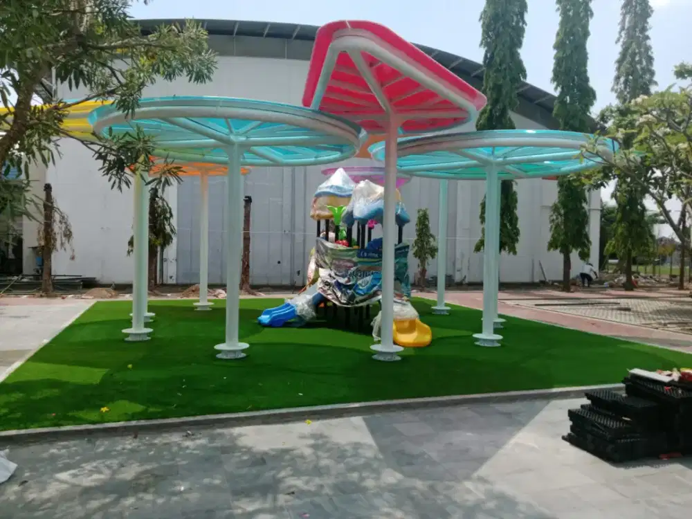 Pemasangan rumput sintetis