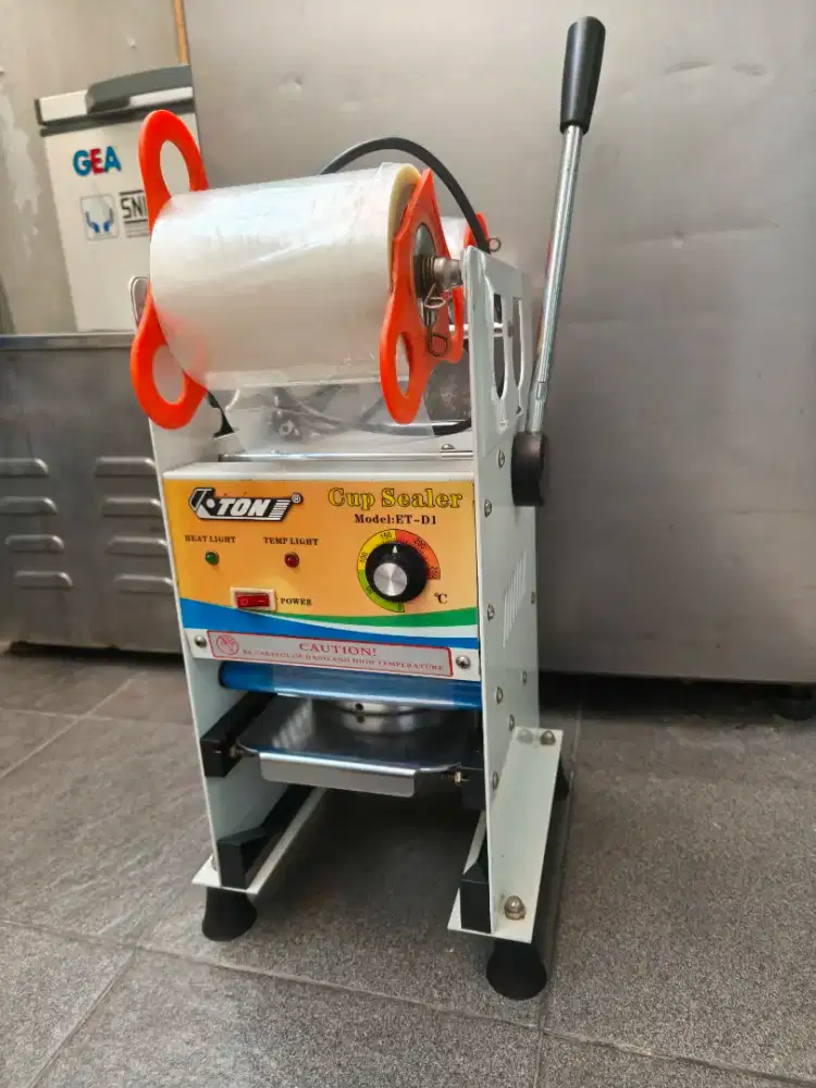 Cup sealer bekas