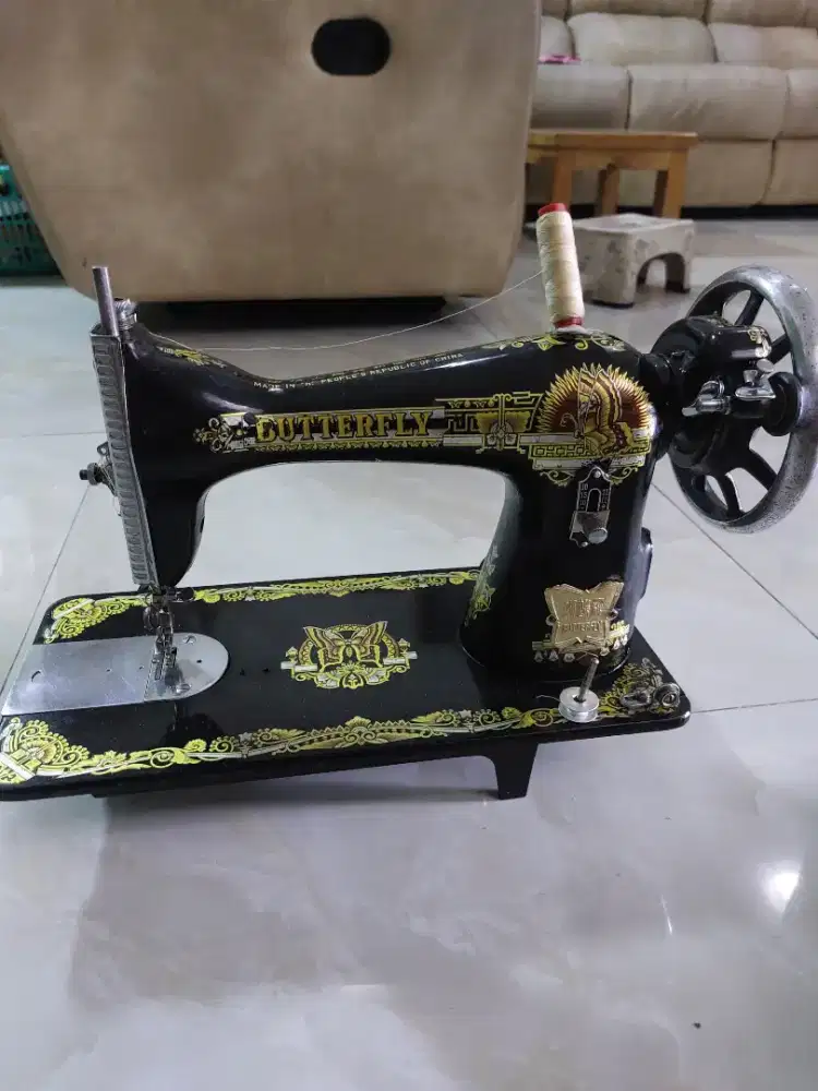 Kepala mesin jahit butterfly