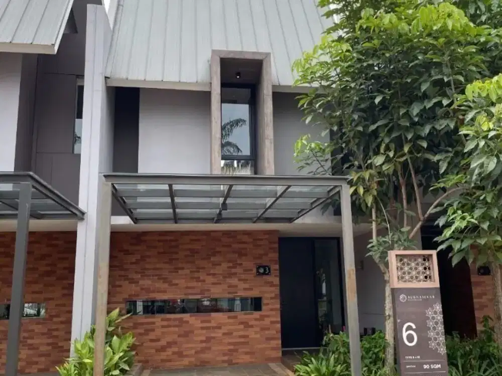 RUMAH PARUNG DENGAN KONSEP BUNGA ABADI DI KOTA MANDIRI YANG ASRI