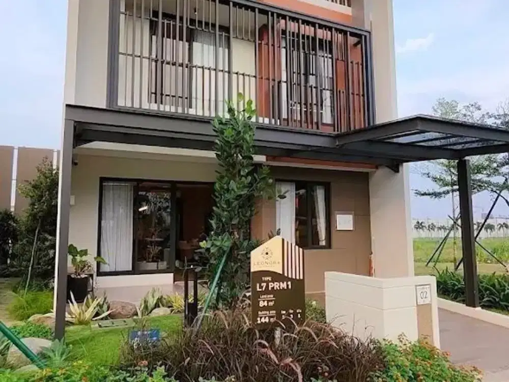 RUMAH SERPONG DENGAN DESAIN FUNGSIONAL DI TENGAH KOTA MANDIRI YANG DIKELILINGI ALAM ASRI