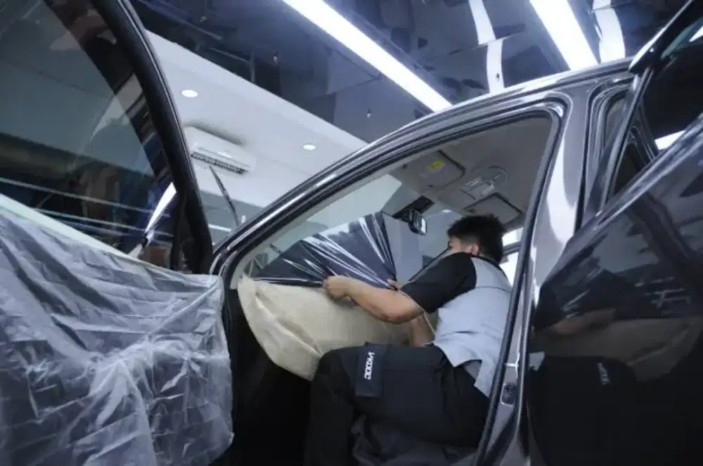 Melayani bongkar pasang kaca film mobil di jamin rapi