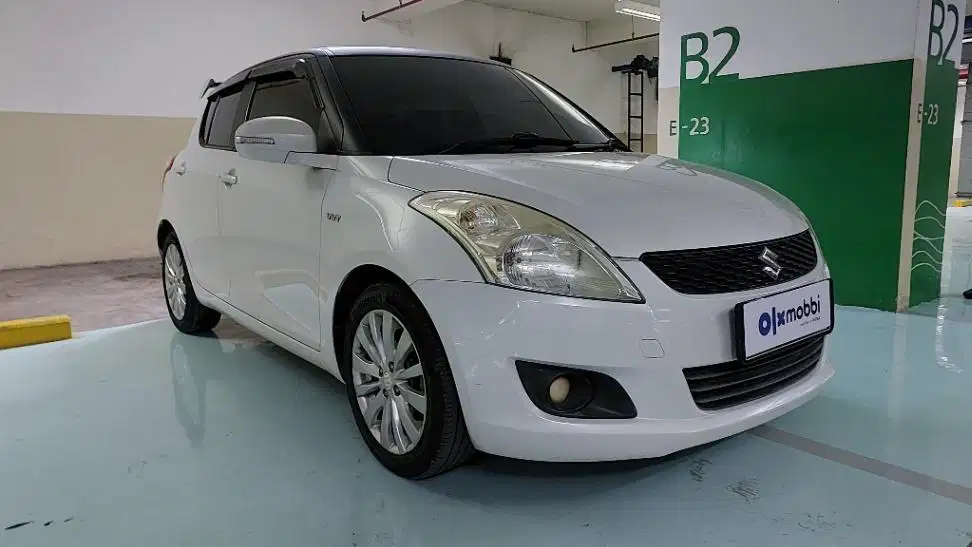 TDP 6,JT Suzuki Swift 1.4 GX Bensin-MT Putih 2012