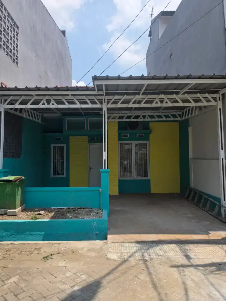 Disewakan rumah di Jalan Raya Jatiwaringin (dalam cluster)