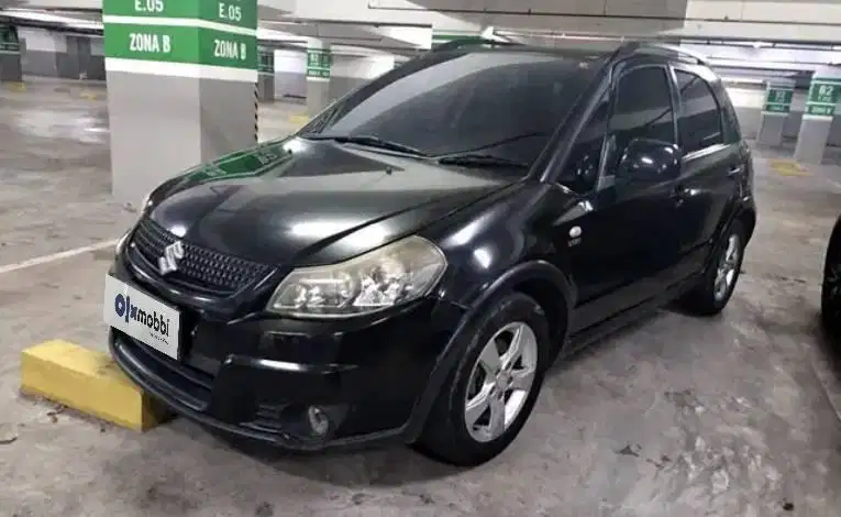 LOW DP Suzuki SX4 1.5 X-Over Bensin-MT 2011 SOW