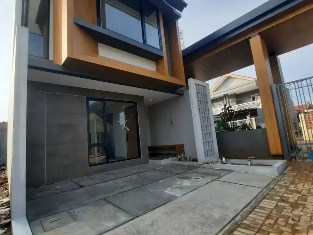 RUMAH CIPUTAT DENGAN KONSEP RESORT TROPIS DITENGAH KOTA MANDIRI TERINTEGRASI