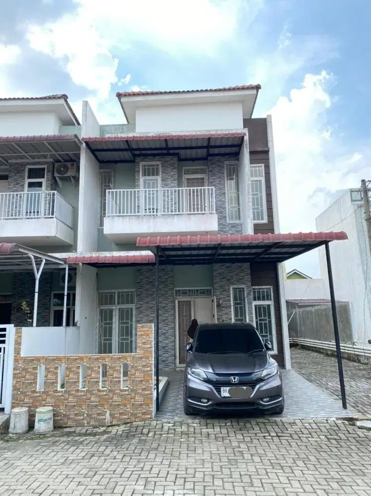 RUMAH DALAM KOMPLEK TAMAN KARYA JAYA INDAH