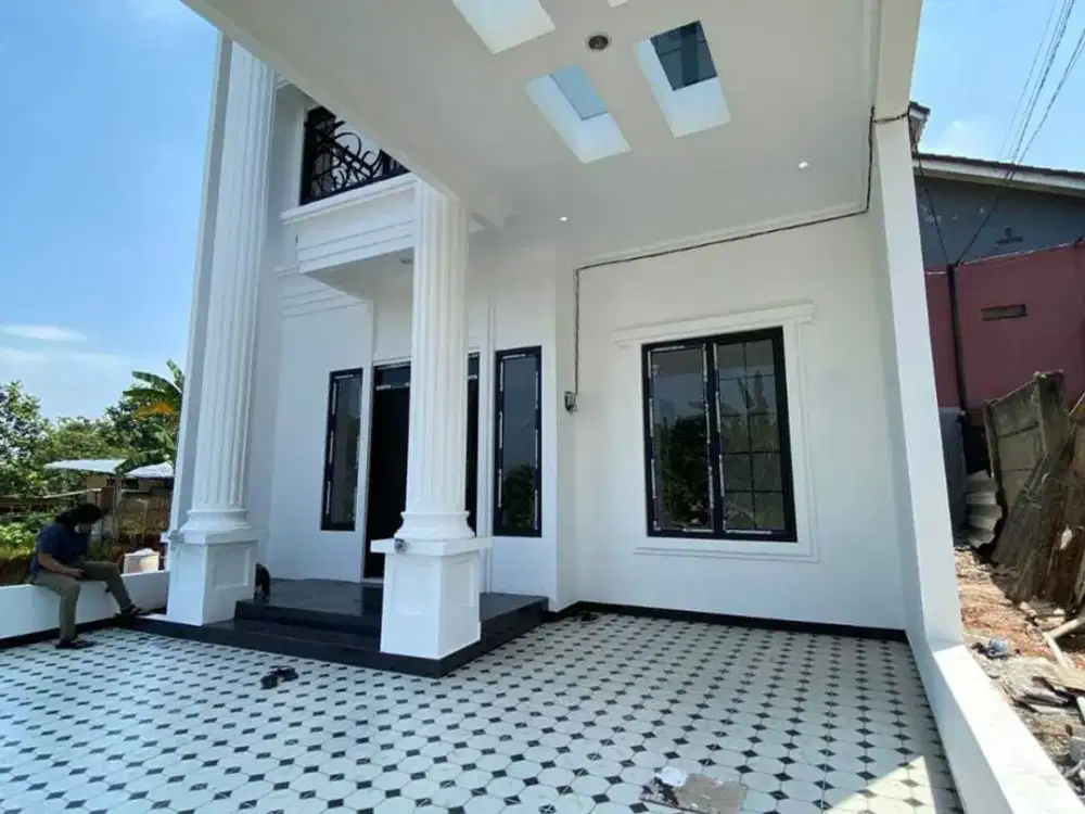 Sebuah Hunian Dalam Cluster  Dengan Dengan Desain Klasik Eropa.
