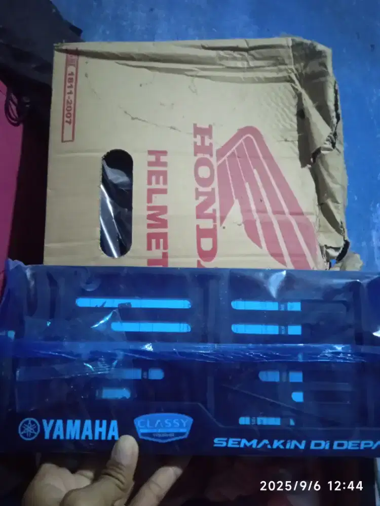 Helm dan cover plat nmr baru