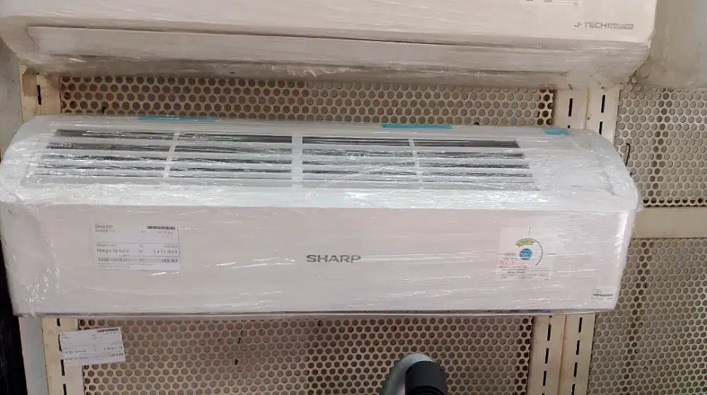 Ac Sharp 1PK kredit melalui Home Credit